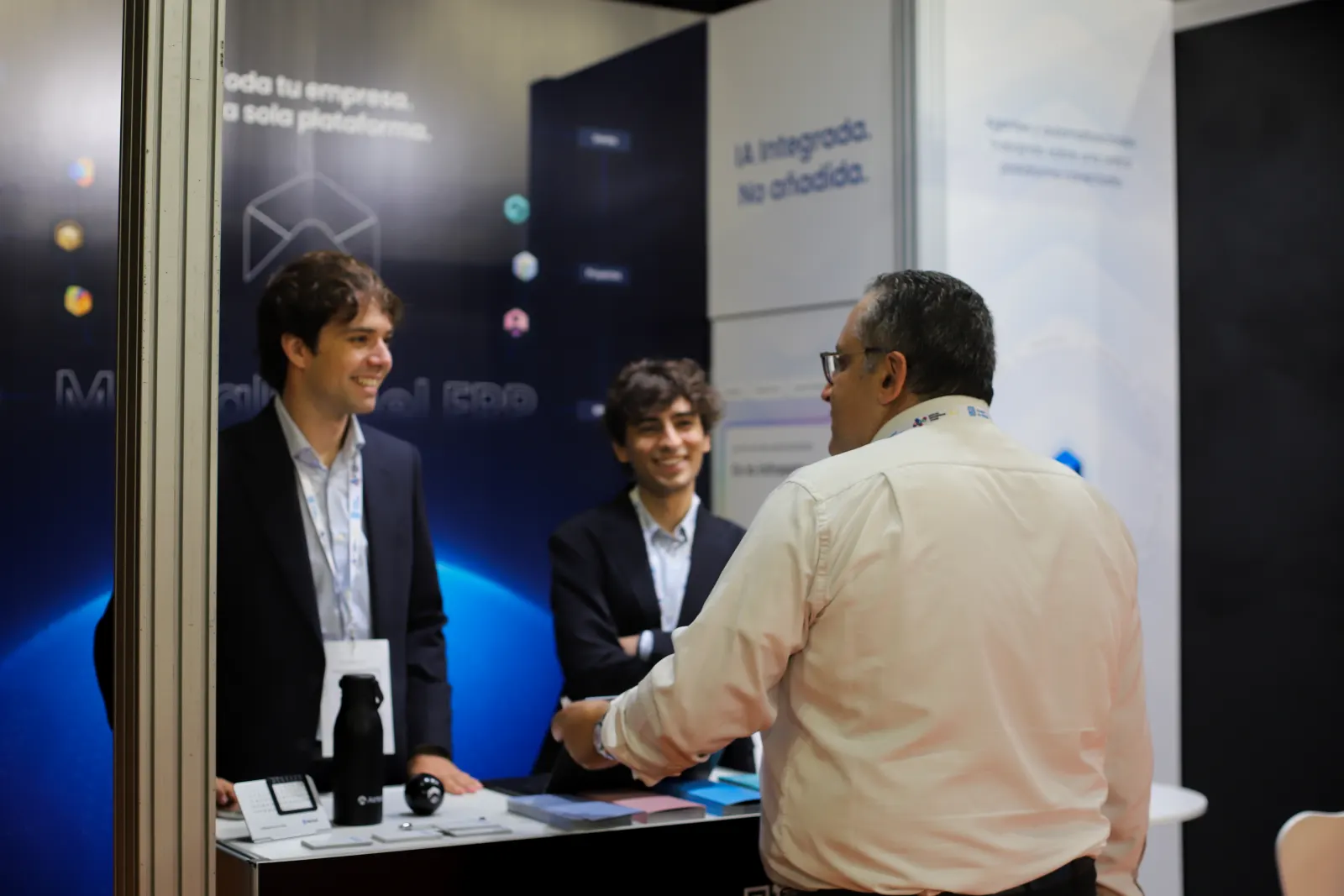 Visitors greeting the team at the Airtool booth desk