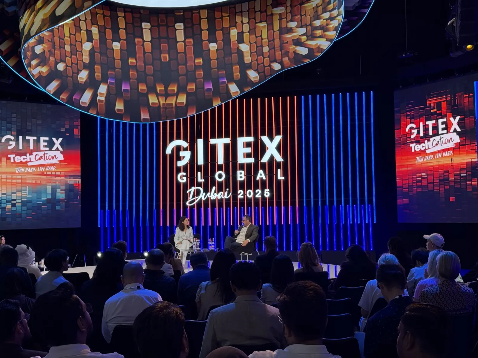 The team at GITEX Global 2025 — Dubai World Trade Centre, main stage