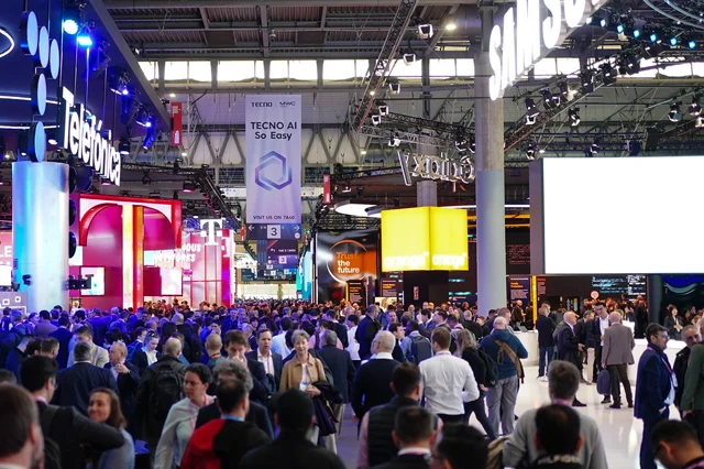 The team on the road — MWC Barcelona 2026, Fira Gran Via exhibition floor.