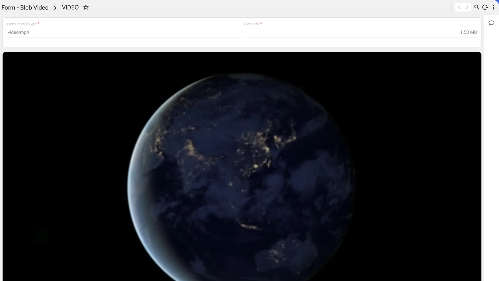 A form showing a blob column of content type video/mp4 at 1.50 MB, with an embedded video player below it showing a frame of the Earth from orbit.